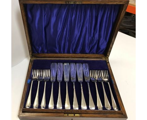 A George V silver ten place fish knife and fork set, "Old English" pattern (by Henry &amp; Arthur Vander for C J Vander, Lond