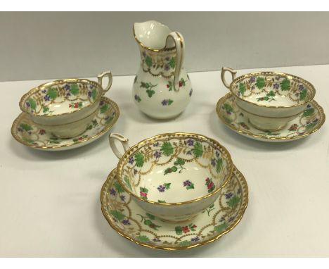 A circa 1900 polychrome and gilt decorated part tea service (maker unknown), retailed by Thomas Goode &amp; Co. of South Audl