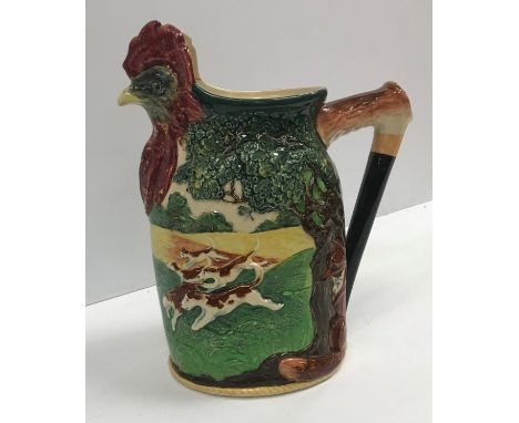 A Royal Doulton “The MFH Presentation Jug”, polychrome decorated in relief with hunting scene and fox seated by a tree, the s