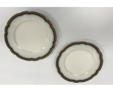 A box containing assorted Royal Worcester, Limoges and Mintons, etc, gilt and blue gilt decorated tea and dinner wares, toget