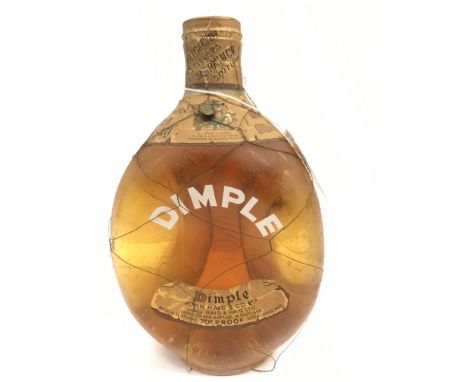 John Haig &amp; Co. Limited "Dimple" Old Blended Scotch Whisky "By Appointment to Her Majesty The Queen", with wire mesh spri
