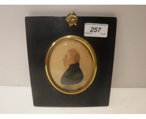 N C LARKIN "Gentleman in black coat and white stock facing left", a head and shoulders miniature portrait study, watercolour 
