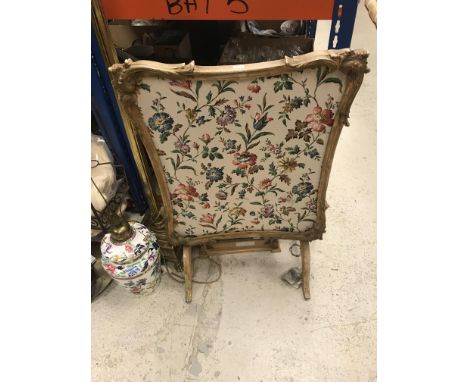 A collection of sundry items to include a fabric covered firescreen, two brass standard lamps, Tiffany style glass lampshade,