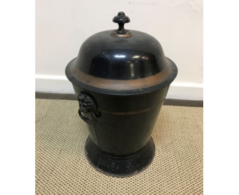 A 19th Century toleware coal box, black painted and gilt banded, the domed top with mushroom finial, the main tapered body wi