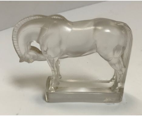 A Lalique miniature horse paperweight with moulded signature "R Lalique France" on a plain rectangular base and incised inscr