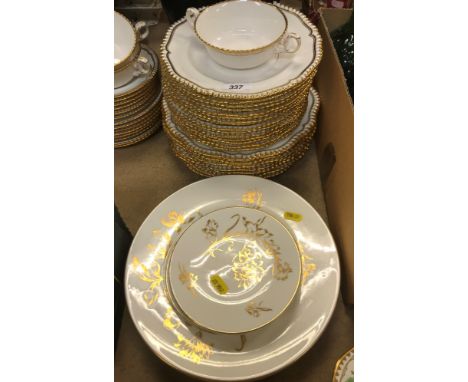 A Spode white glazed and gilt decorated part dinner service with gadrooned rim, design No. 1/4223, bears green printed stamp 