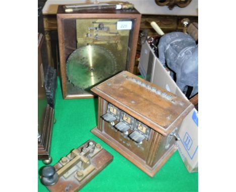 A Venner Time Switches Limited time recorder with AM and PM dial, an oak cased telephone operator switchboard No'd. 1-3 and a
