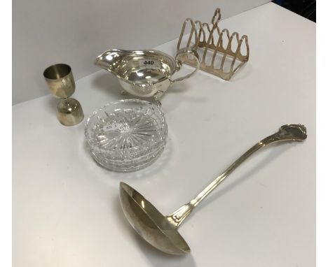 A 20th Century sterling silver soup ladle, 5.93 oz, together with a plated six section toast rack, plated wager cup, pair of 