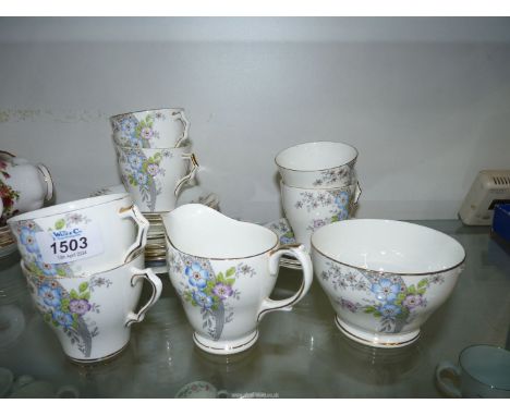 A Windsor bone china Teaset for six (no teapot) in mauve and blue floral pattern.