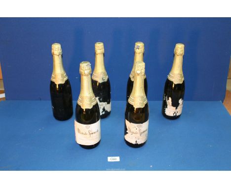 Six bottles of Moscato Spumante sparkling wine.