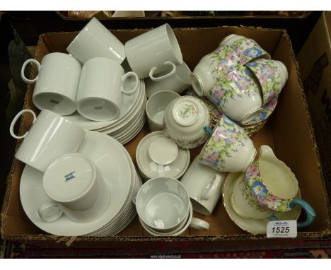 A 'Crown Staffordshire' floral part tea set to include six teacups and saucers, sugar bowl and milk jug, together with 'Thoma