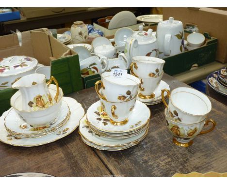 A Royal Imperial china tea set for six (no teapot) with roses and gold rims and handles decoration.