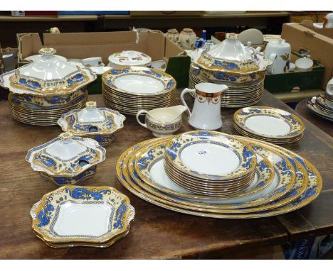 A Grimwades "Ming" part Dinner service in blue, cream and gold decoration to include; twelve dinner plates, side plates, soup