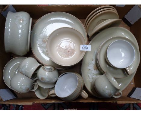 A quantity of Denby stoneware to include; plates, cups & saucers, serving dish, etc.