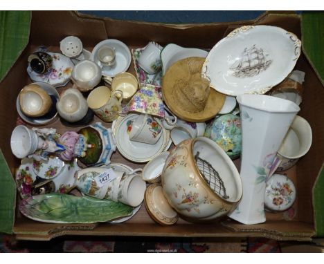 A quantity of china including children's nursery cups and saucers, Souvenir ware, Staffordshire figure, novelty egg cups, Poo