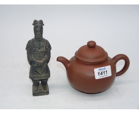 A small Chinese unglazed earthenware teapot, impressed stamp to base, 4 1/2" tall (of some age) and a Terracotta warrior, 6 1