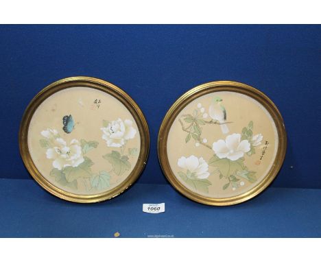 A pair of hand painted Chinese silks of Peonies in gilt roundels, 8 1/2" diameter, both signed and with seal mark.