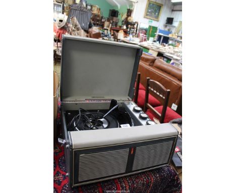 A vintage Bush record player 'Monarch' with tape recording facility.