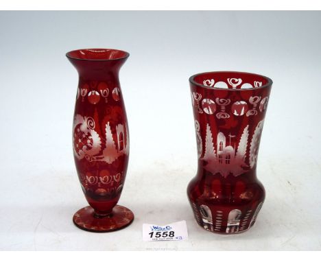 A 19th century Bohemian ruby red deep cut vase decorated with castle and bird, 5" tall, plus another in similar design but di