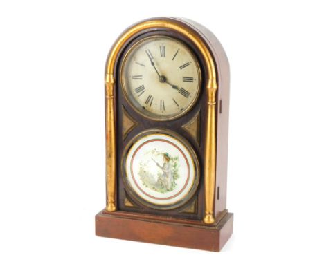 A late 19thC American Seth Thomas rosewood cased mantel clock, the domed top with a gold reeded border, on a white ceramic nu