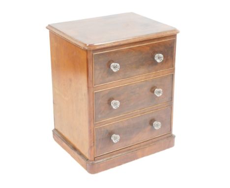 A Victorian mahogany commode, converted with crystal handles on a plinth, 66cm high, 52cm wide, 43cm deep.