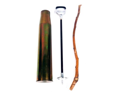 A brass shell case stick stand, with walking stick and shooting stick, 73cm high.