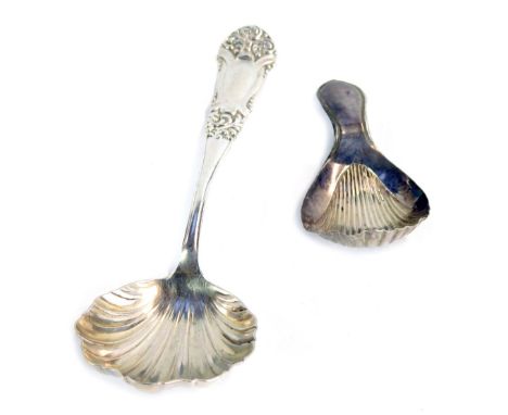 A George III silver caddy spoon, with fluted bowl, Sheffield 1792, and a Victorian silver jam spoon with embossed floral term