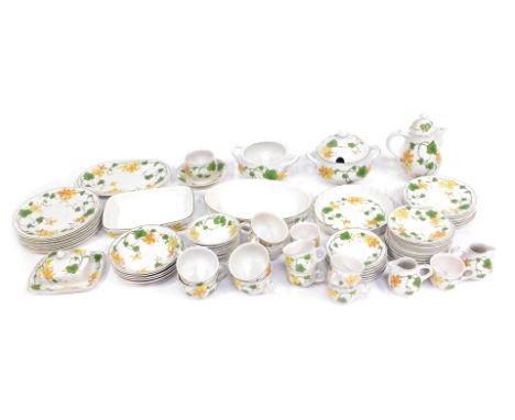 A Villeroy &amp; Boch Geranium pattern pottery part dinner service, comprising two tureens, one cover, oval plate, square ser