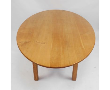 A substantial oval light oak dining table, the rectangular base with chamfered legs, 74cm high, approximately 220cm wide, 13c