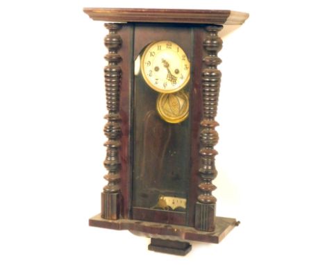 A 19thC mahogany wall clock, with turned pilasters, cream numeric dial, eight day movement with pendulum and key, 70cm high, 