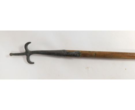 An oak sash window pole, with wrought iron pick end, 210cm long.
