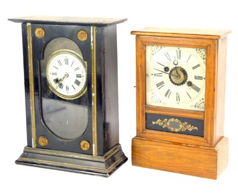 A late 19thC Continental mantel clock, in a black ebonised case with a white Roman numeric dial and gilt pointers, thirty hou