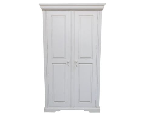 A painted pine two door wardrobe, with a moulded cornice above, two drawers on bracket feet, 196cm high, 112cm wide, 65cm dee