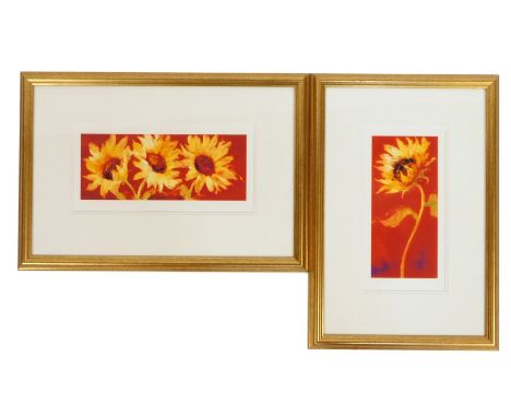 Two sunflower lithograph prints, each on a red ground, 31cm x 14cm, framed and glazed. (2)