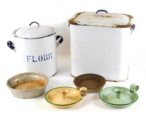 Two enamel bins, comprising a bread bin, 30cm high, and a circular flour tin, 24cm high. (2, AF)
