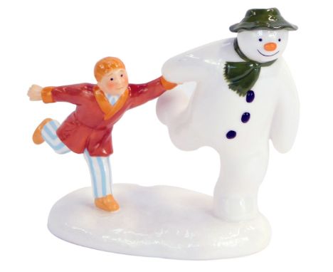 A Coalport Characters The Snowman figure group, The Adventure Begins, Snowman and Boy running, first edition, 13cm high, boxe