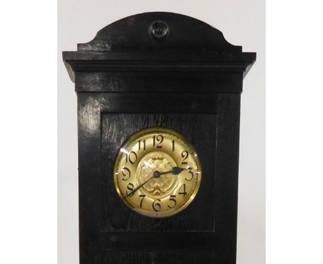 An early 20thC Continental Art Nouveau ebonised oak longcase clock, circular brass dial, with Arabic numerals, two train move