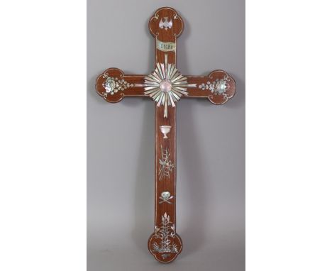 AN EARLY 20TH CENTURY CHINESE MOTHER-OF-PEARL INLAID WOOD CRUCIFIX, decorated with various motifs and with INRI engraved on a