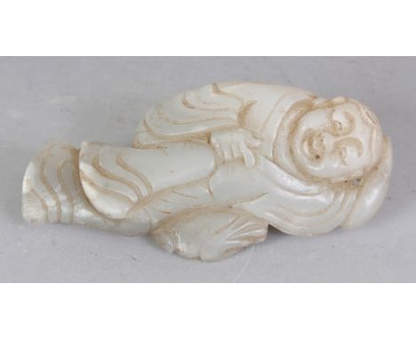 A CHINESE WHITE JADE CARVING OF A DANCING BOY, 3.4in high.