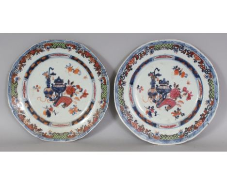 A PAIR OF 18TH CENTURY CHINESE OCTAGONAL PORCELAIN PLATES, each painted in underglaze-blue, iron-red, puce and green enamels,