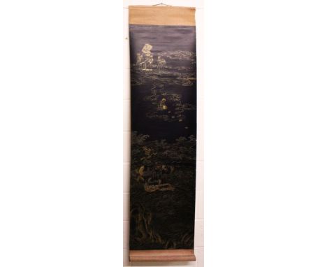 A 20TH CENTURY CHINESE HANGING SCROLL, decorated in gilt on a black ground with cloud and wave borne Immortals, the picture i