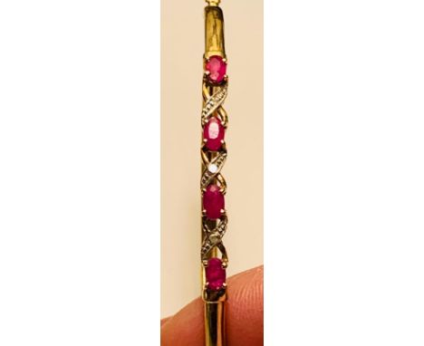 8ct GOLD HOLLOW BANGLE SET WITH FOUR RUBIES, EACH BEING APPROX 0.2ct, PLUS BRILLIANTS, APPROX TOTAL WEIGHT 4.76 AND SIZE 6 x 