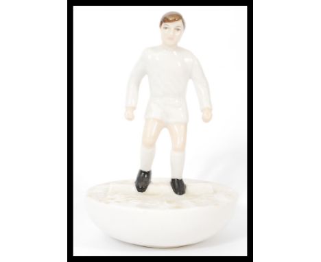 A Royal Doulton Subbuteo ceramic football figurine MCL 12 featuring a player in white kit on white base. Limited edition 122/