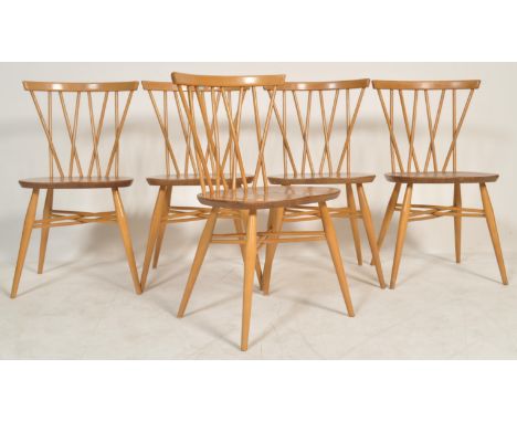 Ercol - Model 376 - A vintage set of five of beech and elm candlestick chairs having crossed spindle backs, a saddle seat and