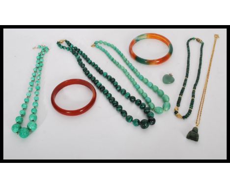 A group of malachite / jade type jewellery to include bead necklaces, heart pendant, Buddha pendant, bangles etc.&nbsp;