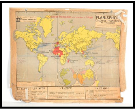 A large vintage early 20th century French map of the globe and Europe with the French Colonies highlighted in red. Map by Duf