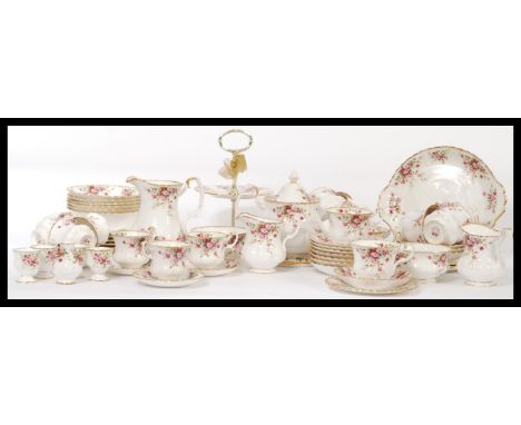 A extensive Royal Albert Cottage Garden tea set, consisting of nine cups and saucers, six coffee cans and saucers, teapot and