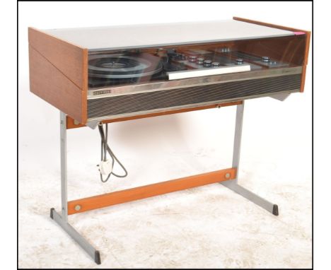 A stunning vintage / retro teak cased Deccasound Compact 3 audio system&nbsp;record player raised on a chrome stand. Smoke pe