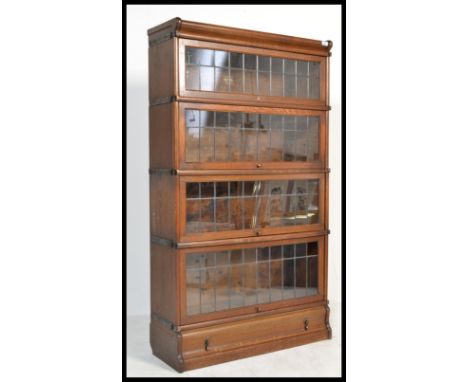 An early 20th Century Edwardian Globe Wernicke mahogany lawyers / barristers modular four section lead panel glazed bookcase,