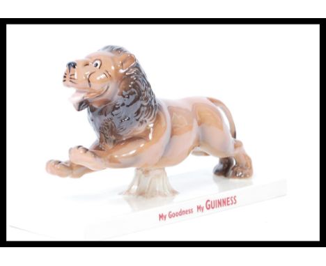 A Coalport ceramic Guinness advertising figurine Lion. Limited Edition 16/1200. Complete in original box with certificate. Me